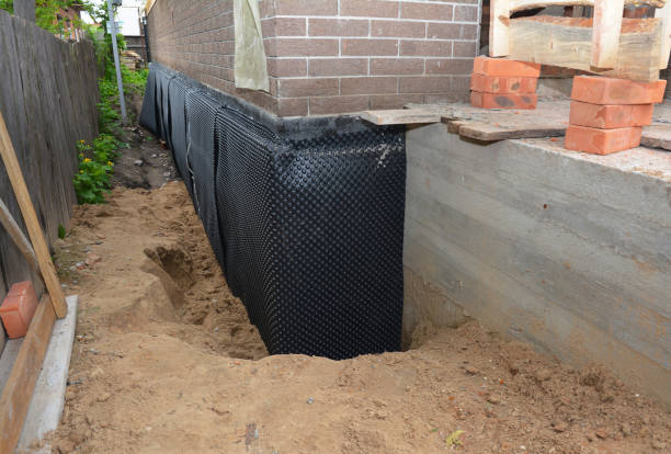SJ Waterproofing Pros technician performing targeted Exterior Waterproofing assessment in Nashville, IN
